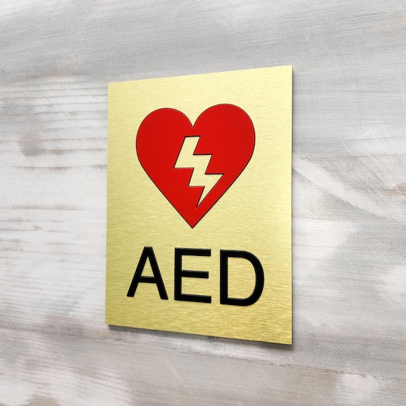 AED sign. Defibrillator sign. Automated external defibrillator sign with red heart. Fire emergency signs. AED safety signs.