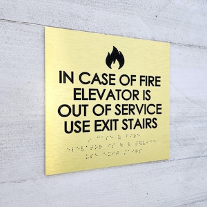 ADA in case of fire use stairs sign. Fire emergency signs. Elevator sign. ADA compliant building signs with Grade 2 Braille and raised text.