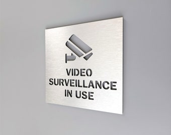 Video surveillance in use. Video security sign. Security camera sign. Surveillance camera signs.