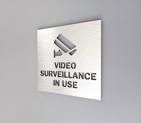 Video surveillance in use. Video security sign. Security camera sign. Surveillance camera signs.