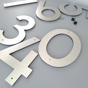 8 inch house numbers and letters. Black, White and Silver modern numbers and letters. Bold numbers.