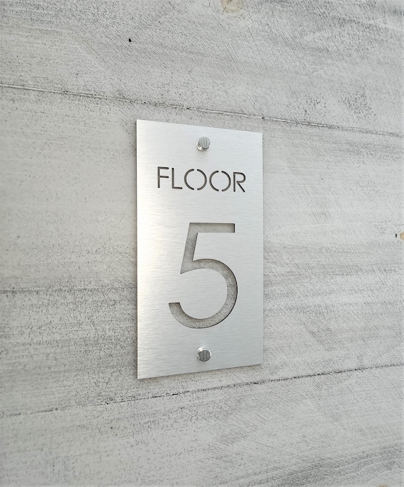 Floor numbers. Level numbers. Floor number signs. Stairway signs. Elevator sign. Stairwell signs. Building signage.