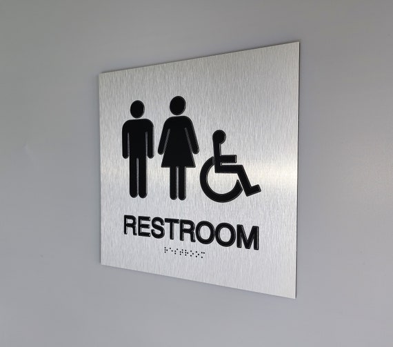 ADA compliant all gender restroom sign. Handicap accessible unisex bathroom. Wheelchair accessible restroom. ADA signs with Braille.