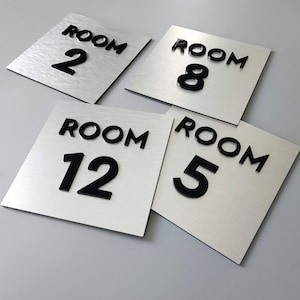 Room number signs. Custom room numbers. Hotel room door number plaques. Unit numbers. Exam rooms. Door signage.
