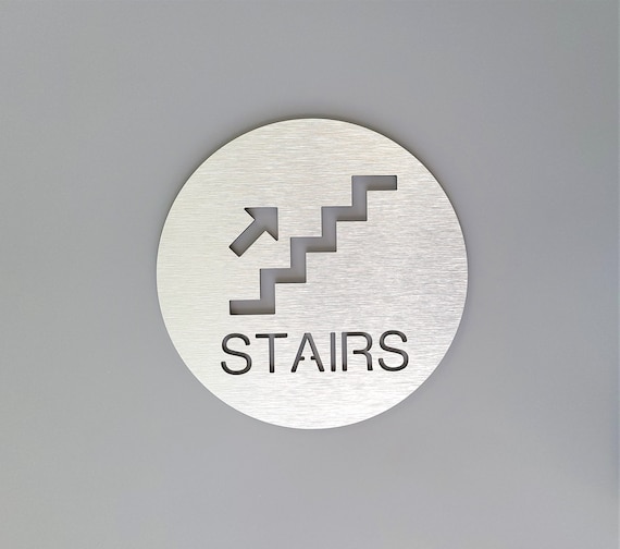 Stairs arrow sign. Information signs. Directional stairs signs. Stairway. Stairwell exit. Safety signs.