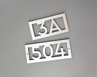 Modern number sign. Door number plaque. Apartment numbers and letters. Hotel room numbers.