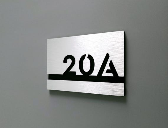 Brushed silver room number signs. Apartment numbers. Hotel room number plates. Custom number signs. Modern address signs. Room numbers.