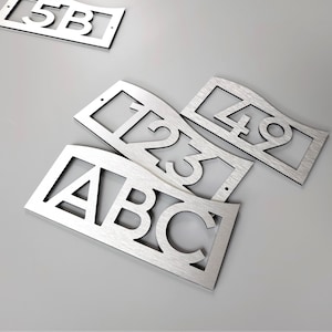 Custom door number. Modern number plaque. Apartment numbers. Hotel room number signs. Unit numbers and letters. Silver. Gold. Black. White.