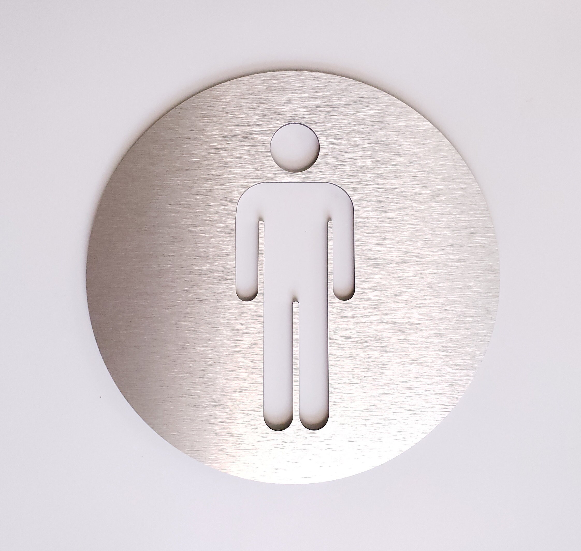 Male bathroom sign. Metal restroom door sign. Men's toilet. Modern