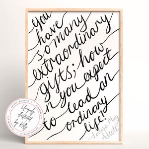 May include: A framed print featuring a quote in black script on a white background: "You have so many extraordinary gifts; how you expect to lead an ordinary life?" Signed by Louisa May Alcott.