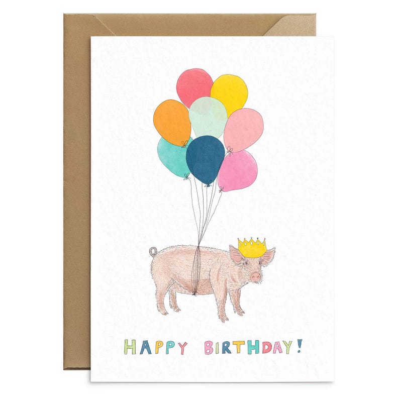 May include: A pink pig wearing a gold crown is floating in the air with colorful balloons. The text "HAPPY BIRTHDAY!" is written below the pig.