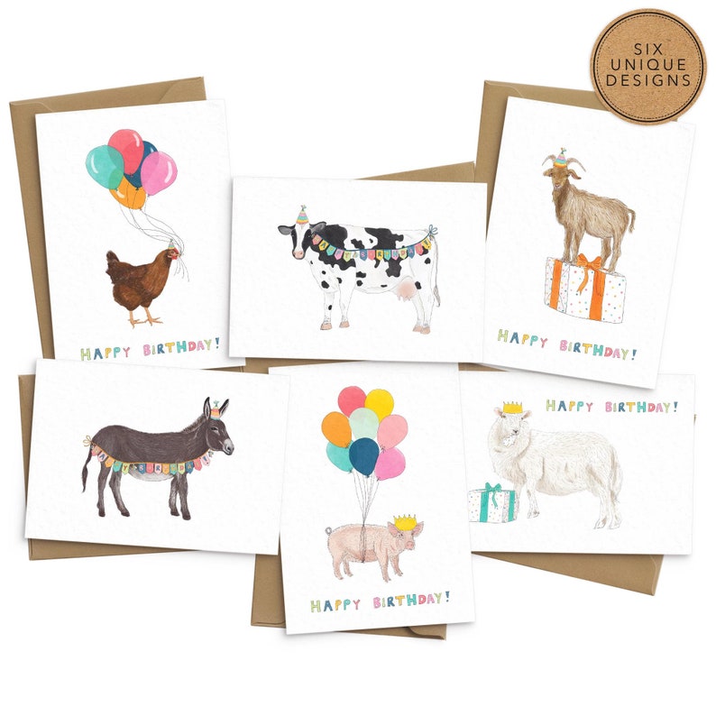 May include: Six illustrated greeting cards featuring farm animals wearing party hats and holding balloons. The cards have a brown kraft paper envelope and say "Happy Birthday!" on each card.