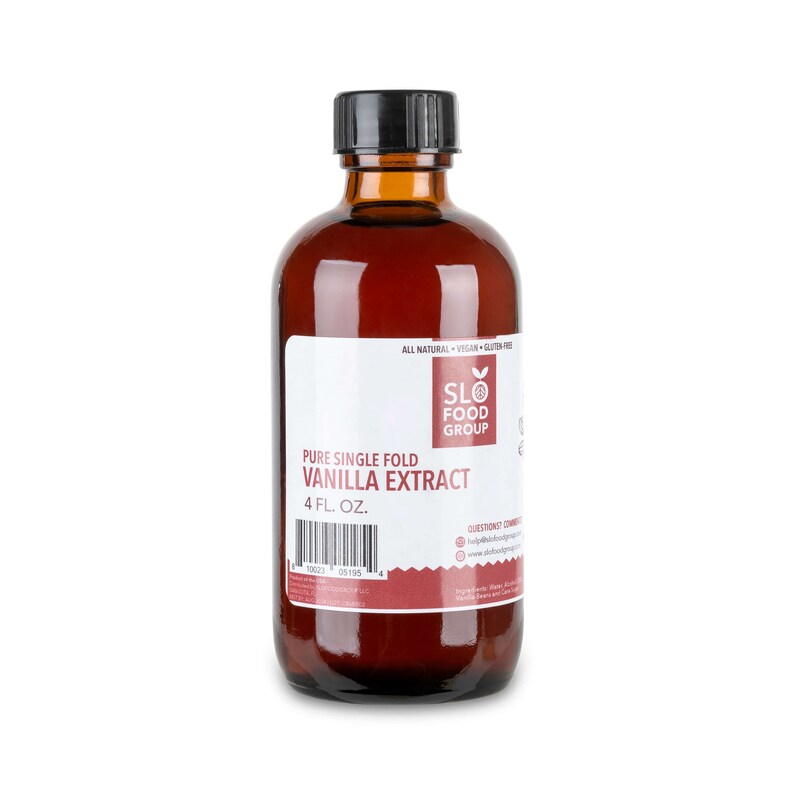 May include: A glass bottle of pure single fold vanilla extract, labeled "SLO Food Group" and "4 fl. oz.". The bottle is brown and has a black cap.