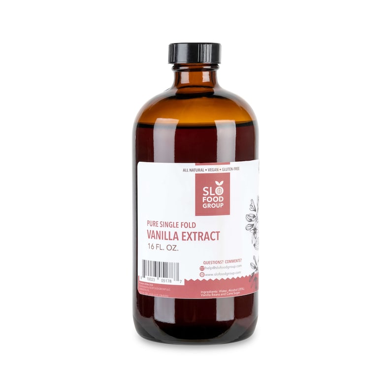 May include: A brown glass bottle of pure single fold vanilla extract, labeled "SLO FOOD GROUP" and "16 FL. OZ.". The bottle is on a white background.