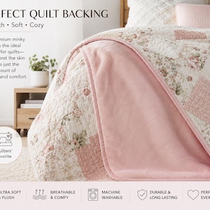May include: A light pink minky fabric quilt backing featuring a smooth texture. The quilt displays a floral pattern with white and pink squares. Text on the image includes PERFECT QUILT BACKING, Smooth, Soft, Cozy, and Quilters' Favorite.