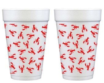 May include: Two white disposable foam cups featuring a repeating pattern of small, bright red lobster illustrations oriented in various directions across the exterior surface of each cup, with a smooth rim and a tapered cylindrical shape.