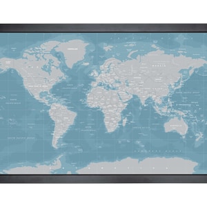 May include: A framed world map with a blue background and grey country outlines. The map includes oceans, continents, and major cities.