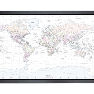 May include: A black framed world map with a white background and blue oceans. The map shows the continents of the world with country borders and major cities labelled. The map is titled "World Map" in the bottom right corner.