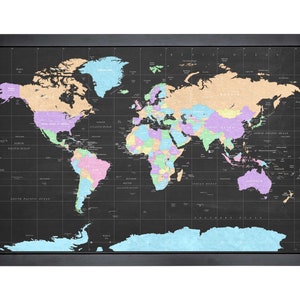 May include: A framed world map with a black background and a grid pattern. The continents are outlined in pastel colours, including pink, purple, blue, and green. The oceans are a light blue colour. The map is framed in a black frame.
