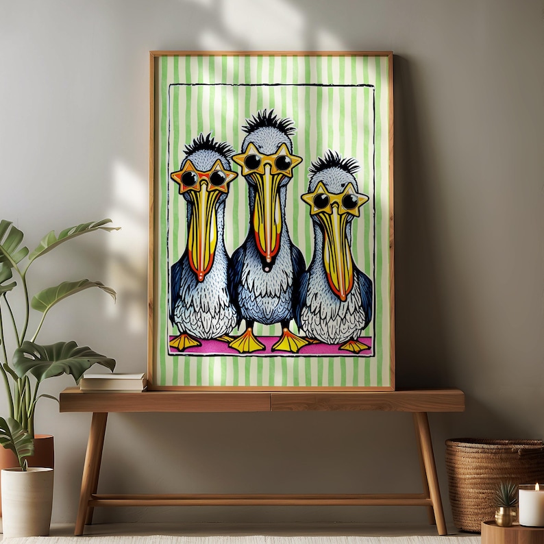 May include: Three cartoon pelicans wearing sunglasses with star-shaped lenses. The pelicans are standing in a row on a pink stripe against a green and white striped background.