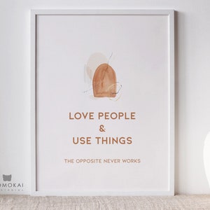 May include: A minimalist printable wall art design with a brown abstract shape and the text "LOVE PEOPLE & USE THINGS THE OPPOSITE NEVER WORKS".