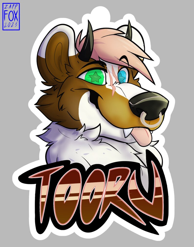 May include: A cartoon illustration of a furry animal with brown fur, white fur, pink hair, and green and blue eyes. The animal has a nose ring and is sticking its tongue out. The animal's name, "TOORU", is written in large, stylized letters below the animal.