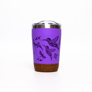 May include: Purple stainless steel travel mug with a cork base and a design of hummingbirds and flowers.
