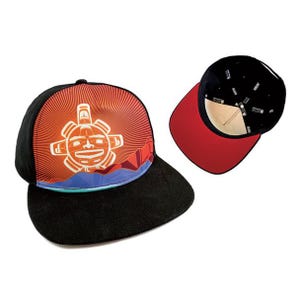 May include: A black and red baseball cap with a graphic of a stylized sun with a face. The sun is orange and red with a blue and green background. The cap has a black brim and a red underside.