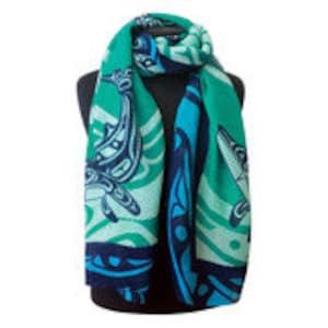 May include: A teal blue and navy blue scarf featuring a stylised design of two orcas swimming in waves. The design is in a traditional Northwest Coast style.