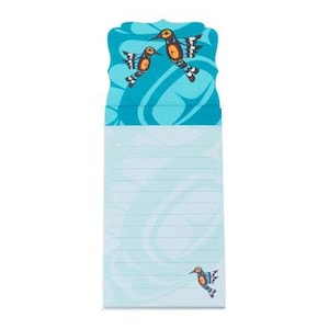 May include: A light blue notepad with a decorative hummingbird design. The top section features two hummingbirds with orange, black, and white details against a swirling blue background. The lined notepad has a single hummingbird at the bottom.