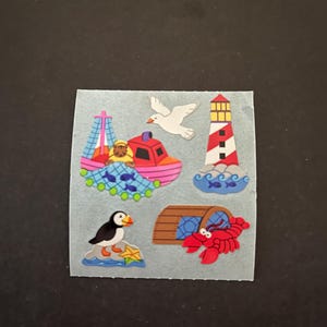 Autocollants vintage très rare en papier Sandylion bord de mer, phare, crabe, mouette, macareux