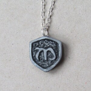 Mikaelson crest inspired polymer clay necklace charm
