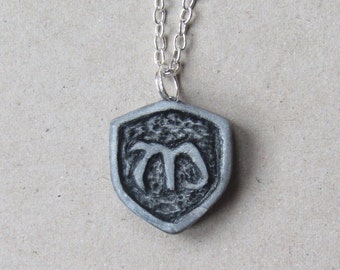 Mikaelson crest inspired polymer clay necklace charm