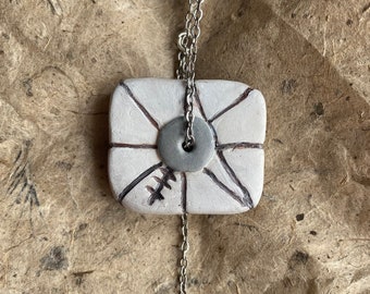 Qetsiyah talisman inspired polymer clay necklace