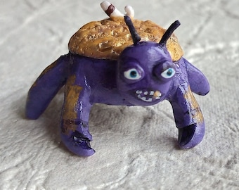 Tamatoa inspired miniature polymer clay figurine