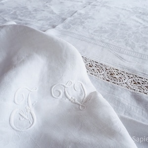 Lovely large silky damask French embroidered table cloth 67" x 91" with 2 monograms JV or FV, crochet bands