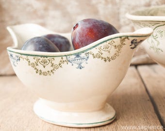 Antique French ironstone gravy or sauce boat, white with green and blue decor transfer ware