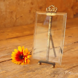 Good size antique French photo or picture frame with thick beveled glass and brass bow ribbon