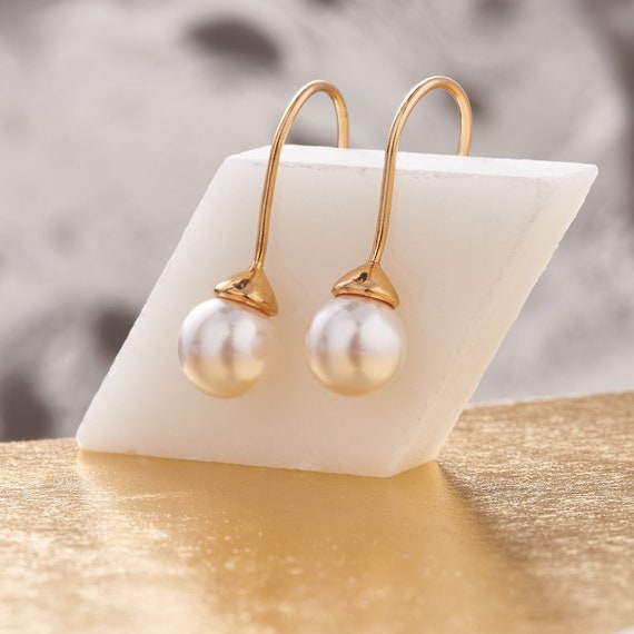 White pearl long best sale earrings