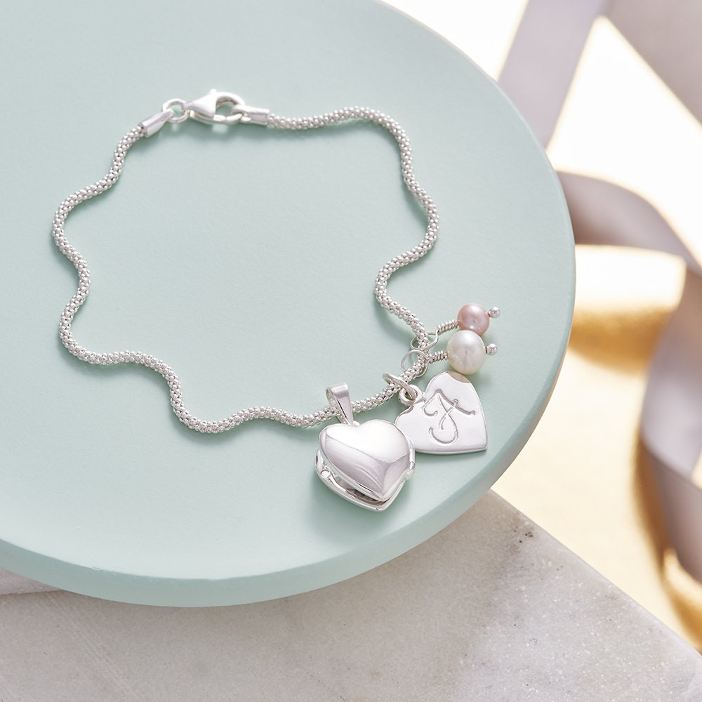 Silver heart locket bracelet deals