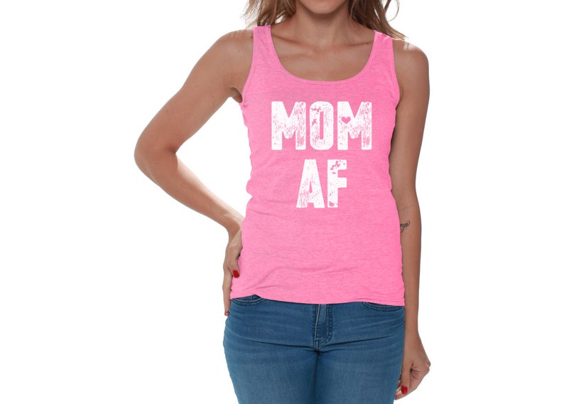 May include: Pink tank top with the text "MOM AF" in white lettering.
