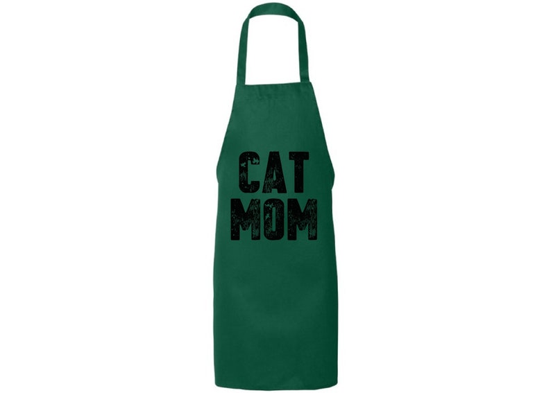 May include: A green apron with the text "CAT MOM" in black lettering.