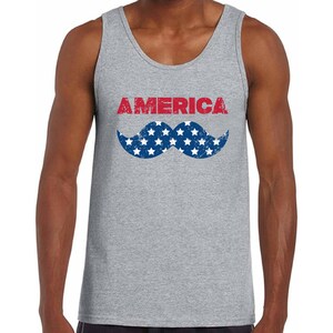 May include: A gray tank top with the word "AMERICA" printed in red letters and a blue and white American flag-themed mustache underneath.