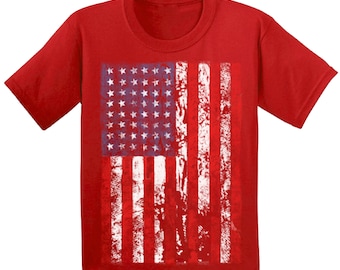 May include: Red t-shirt with a distressed American flag graphic.
