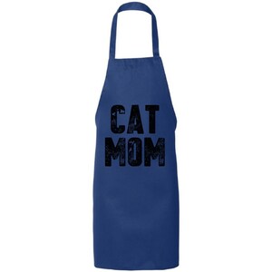 May include: A navy blue apron with the text "CAT MOM" in black, distressed lettering.