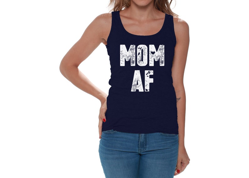 May include: A navy blue tank top with the text "MOM AF" in white distressed lettering.