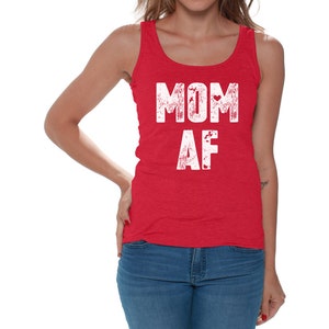 May include: Red tank top with the text "MOM AF" in white lettering.