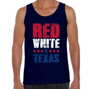 May include: A navy blue tank top with a distressed graphic design that reads "RED WHITE & TEXAS" in red, white, and blue.