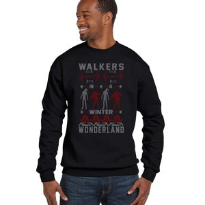 May include: Black sweatshirt with a red and gray design that says "Walkers in a Winter Wonderland" with a graphic of zombies.