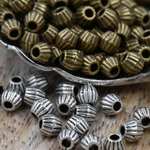 200 beads, Antique Silver or Bronze Bicone 4mm Spacer beads